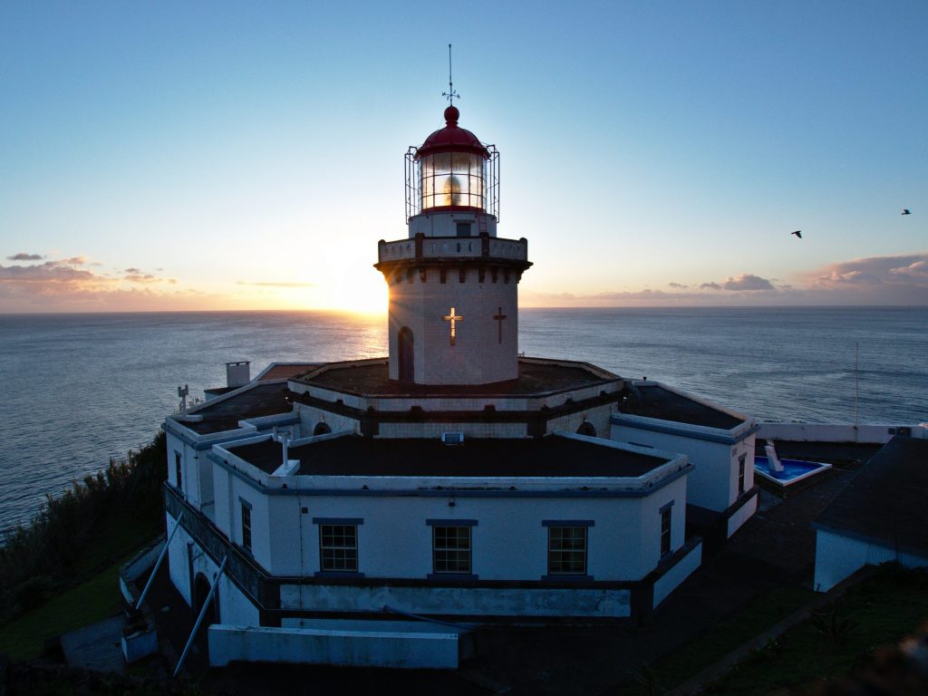 Farol Ponta do Arnel during sunrise Dusk by the "Farol Ponta do Arnel"