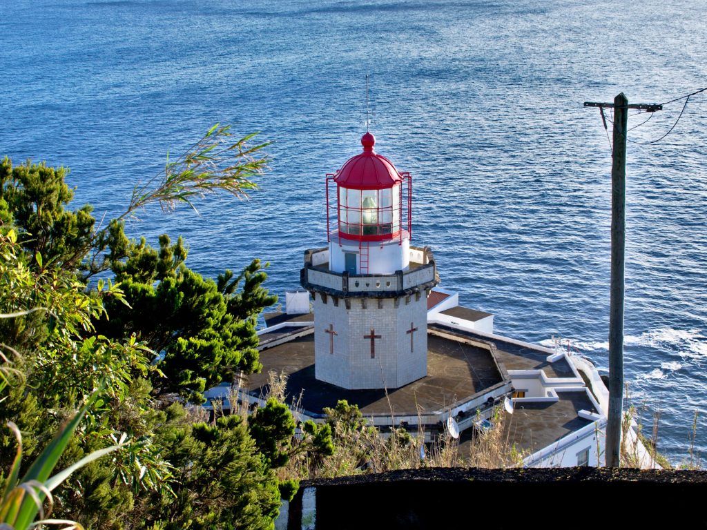 Farol Ponta do Arnel The Farol Ponta do Arnel on Sao Miguel is one of the prettiest lighthouses on the island.