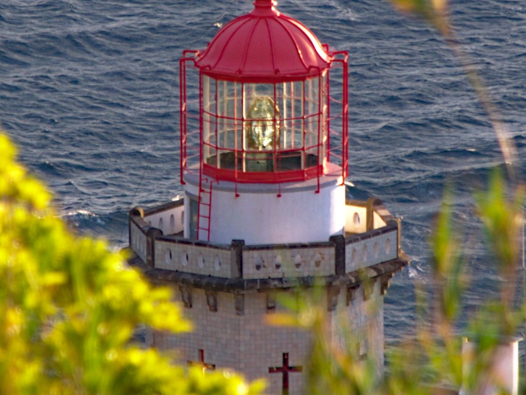 Farol Ponto do Arnel seen from the Miradouro da Vista dos Barcos Farol Ponto do Arnel seen from the Miradouro da Vista dos Barcos
