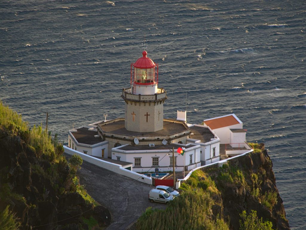 Farol Ponto do Arnel seen from the Miradouro da Vista dos Barcos Farol Ponto do Arnel seen from the Miradouro da Vista dos Barcos