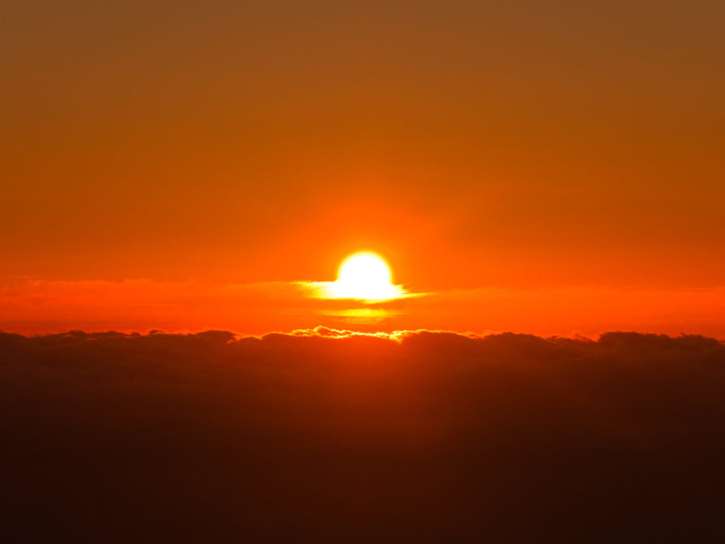 The sun disappears behind the clouds in the Atlantic The sun disappears behind the clouds in the Atlantic
